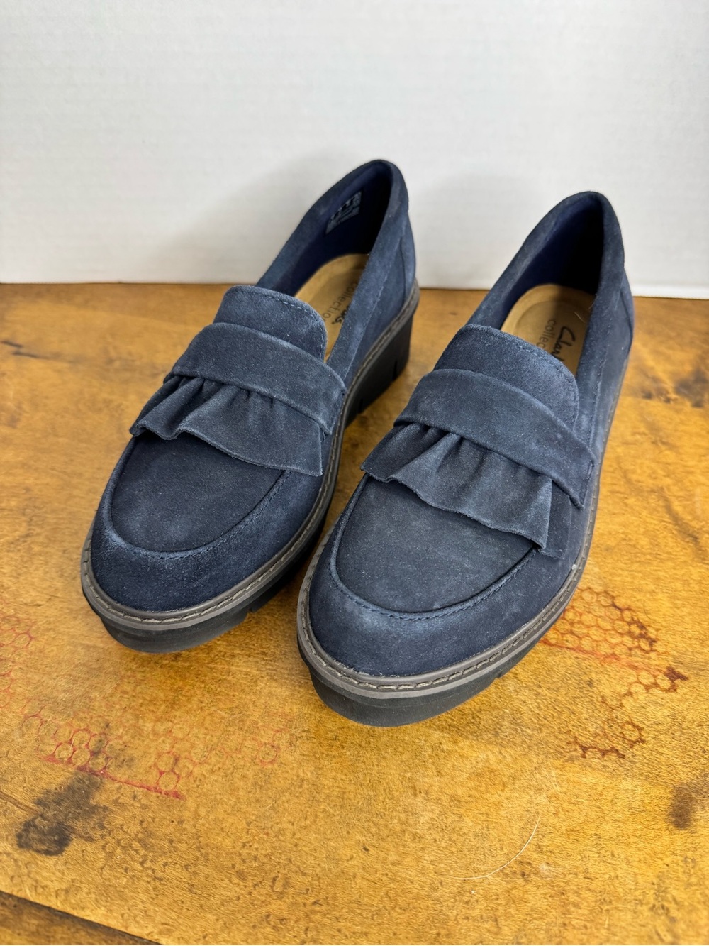 Clark’s Navy Platform Loafers